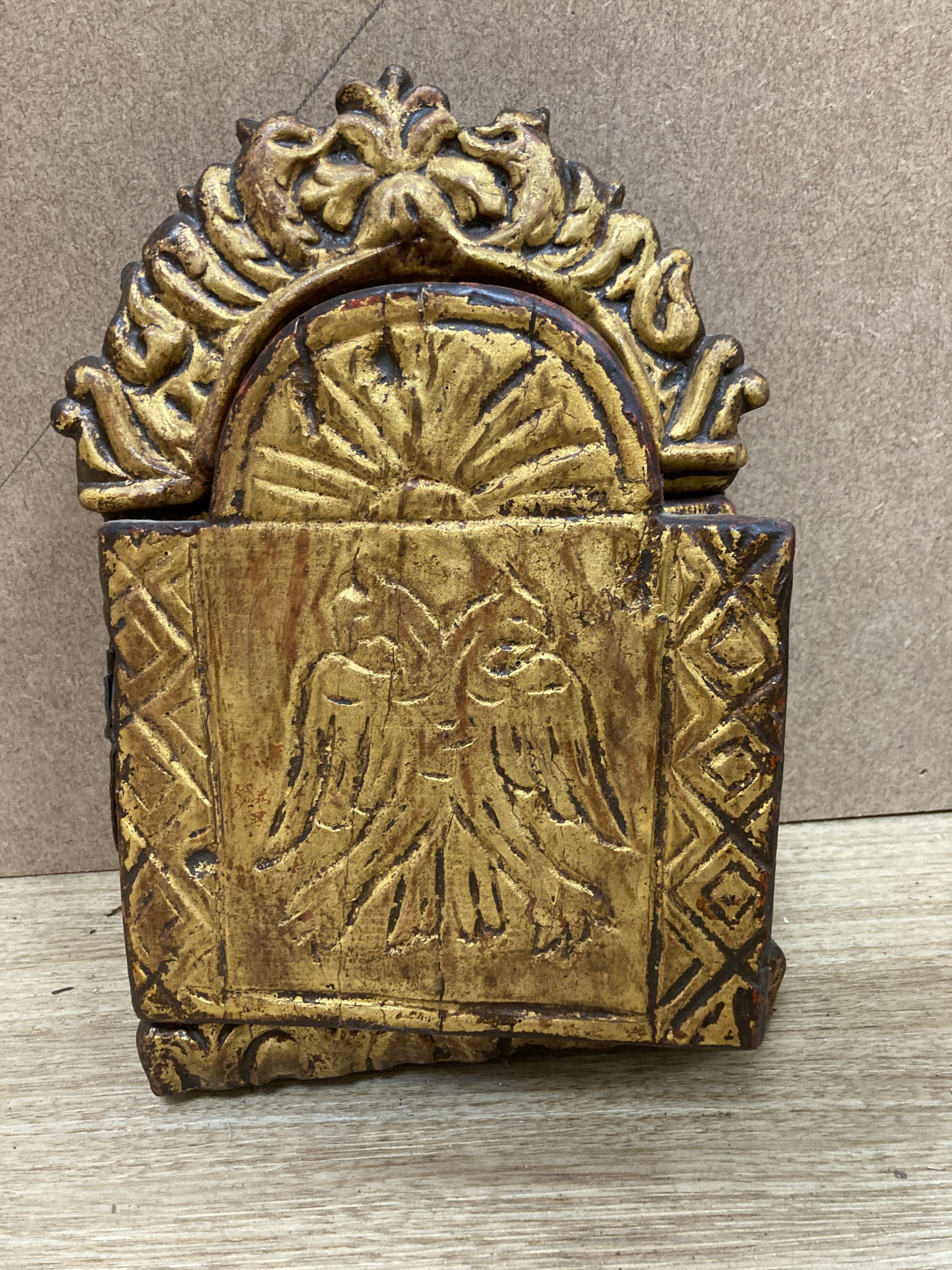A tempera on wood triptych icon, height overall 25cm and a single Virgin and child icon, 21 x 17cm